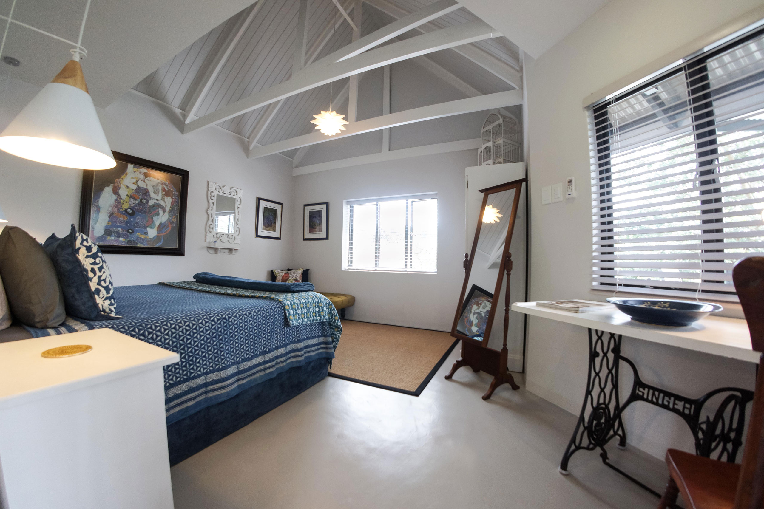 Large airconditioned bedroom with kingsized bed
